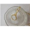 Image 2 : Clear dresser tray with a loupe on a necklace
