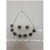 Image 1 : Black, purple, and green confetti necklace and clip earrings marked “Coro”