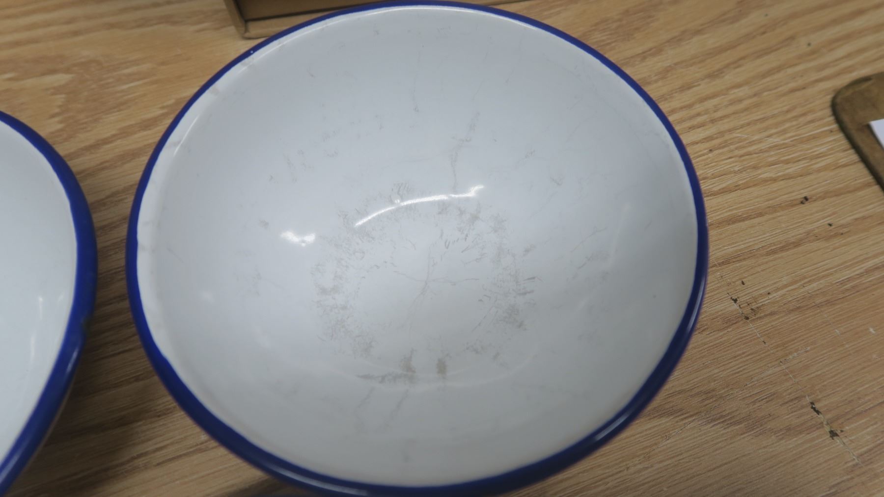 5 enamel bowls white with blue rims