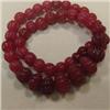 Image 1 : 470 CTS CARVED GLASS FILLED ENHANCED RUBY STRAND - TEMPORARY CLASP