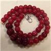 Image 1 : 422 CTS CARVED GLASS FILLED ENHANCED RUBY STRAND - TEMPORARY CLASP