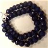 Image 1 : 730 CTS CARVED GLASS FILLED ENHANCED SAPPHIRE STRAND - TEMPORARY CLASP