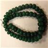 Image 1 : 515 CTS CARVED GLASS FILLED ENHANCED EMERALD STRAND - TEMPORARY CLASP