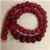 Image 1 : 430 CTS CARVED GLASS FILLED ENHANCED RUBY STRAND - TEMPORARY CLASP