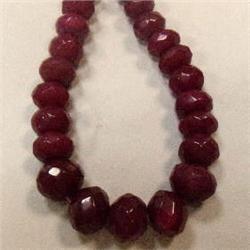 680 CTS CARVED GLASS FILLED ENHANCED RUBY STRAND - TEMPORARY CLASP