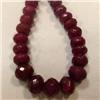 Image 1 : 680 CTS CARVED GLASS FILLED ENHANCED RUBY STRAND - TEMPORARY CLASP