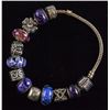 Image 1 : Silver Bracelet with Blue and Purple Charms