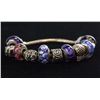 Image 2 : Silver Bracelet with Blue and Purple Charms