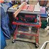 Image 1 : BOSCH 10" TABLE SAW WITH STAND WORKING