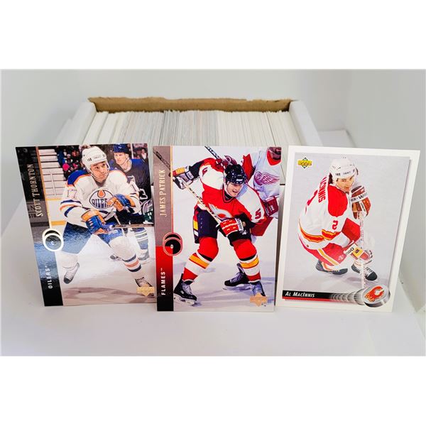 3)  BOXED LOT OF HUNDREDS OF ASSORTED NHL