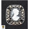 Image 1 : BLACK N WHITE CAMEO BROOCH