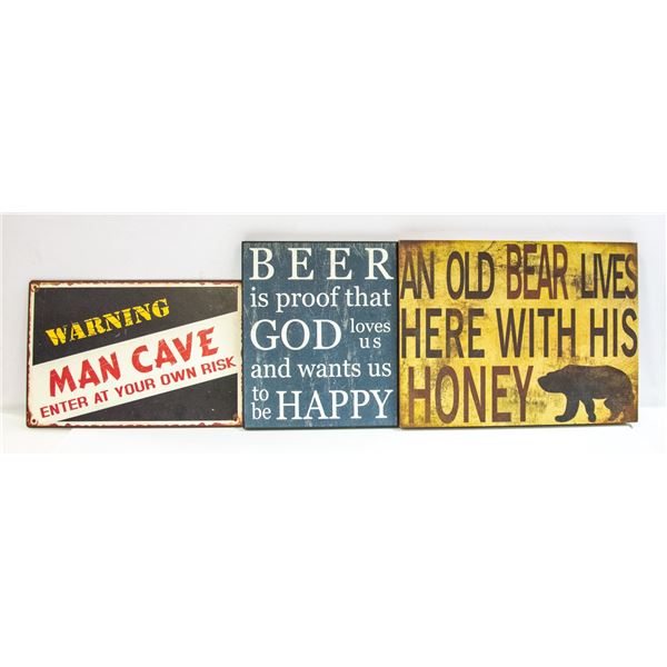 FLAT OF 3 MAN CAVE SIGNS