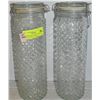 Image 1 : PAIR OF LIGHT GREEN 13 INCH GLASS STORAGE JARS