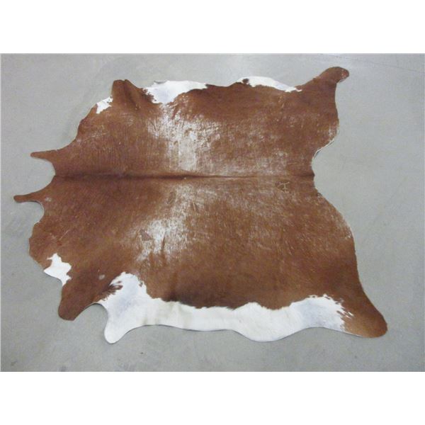Tanned Brazilian Cowhide With Brand- 74" X 74"