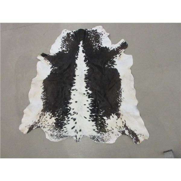 Tanned Brazilian Cowhide- 58" X 55"- Good Shape