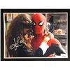 Image 1 : ZENDAYA AND TOM HOLLAND SIGNED SPIDER-MAN 8 X 10 (RA COA)