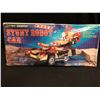 Image 1 : BATTERY OPERATED STUNT ROBOT CAR