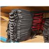 Image 2 : STACK OF RED / BLACK FABRIC HELMET TRANSPORT BAGS