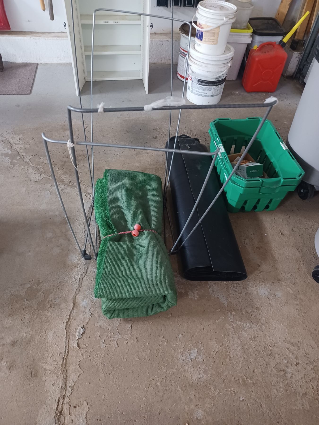 TWO YARD BAG HOLDERS, CHUNK OF ASTRA TURF, FLOOR MAT, TWO GARBAGE CANS ...