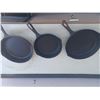Image 6 : FIVE CAST IRON PANS, TWO CAST ALUMINIUM PANS,