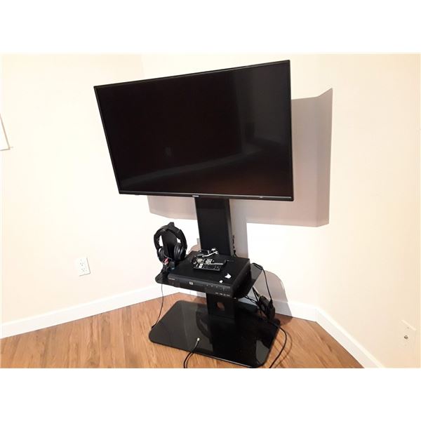 43" Toshiba TV, Magnasonic DVD Player, With Stand + Head Phones