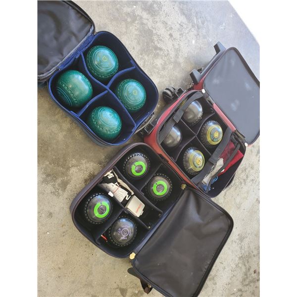 3 set of four lawn bowling balls in cases & more