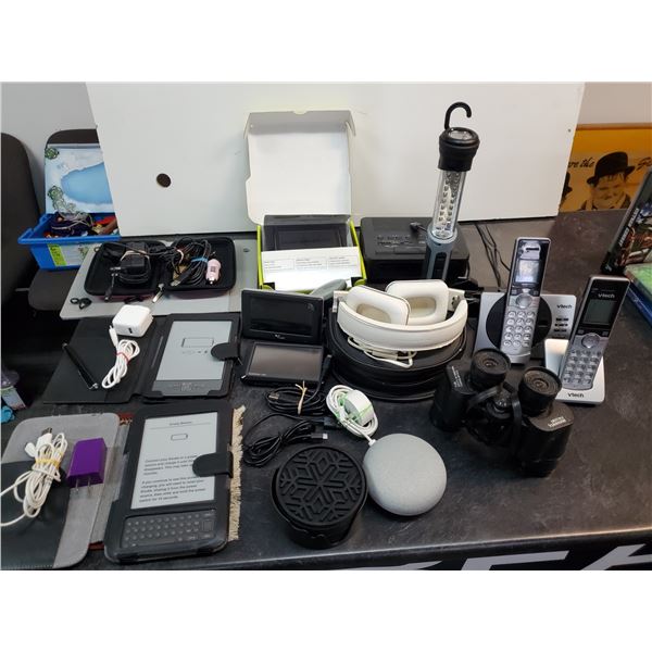 Electronics lot including Bushnell binoculars 2 E readers GPS and more