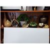 Image 1 : Shelf of clay bases stone carvings and more