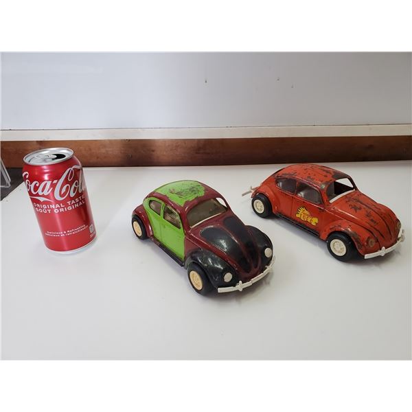 Two VW Bug models