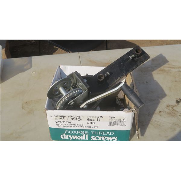 Box with 2- truck camper tie downs, 1- hand crank