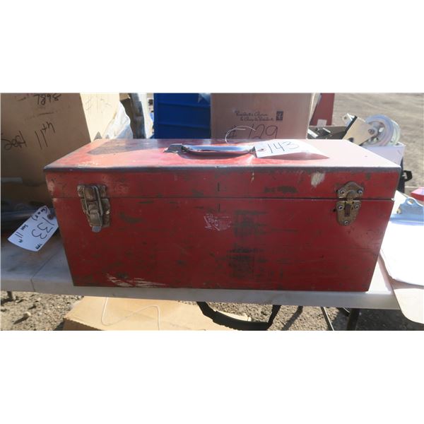 older red metal tool box with one broken latch, misc. items inside.