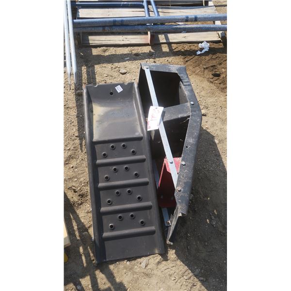 2 black metal car ramps