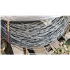 Image 4 : pallet with rolls of used smooth braded fence wire.