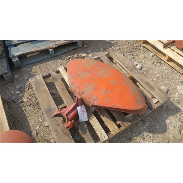 pallet with 2 med clam style tractor fenders.