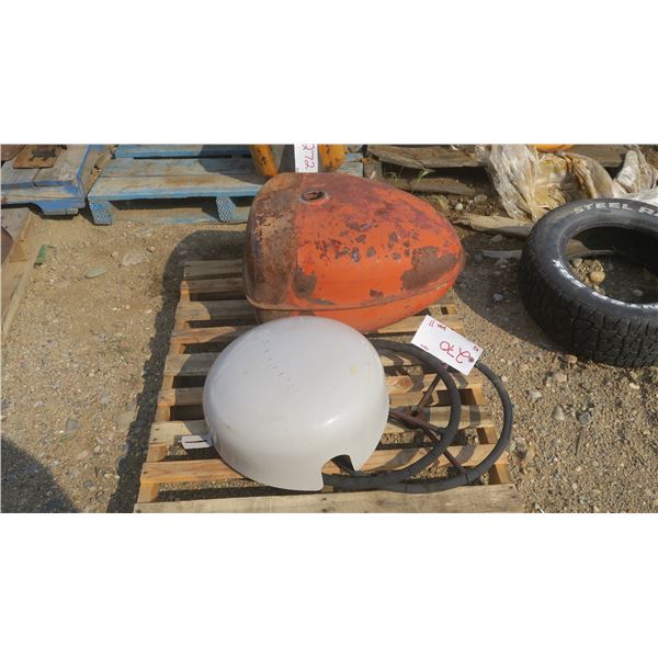 pallet with 2 tractor steering wheels, antique Case fuel tank, metal grey dome.