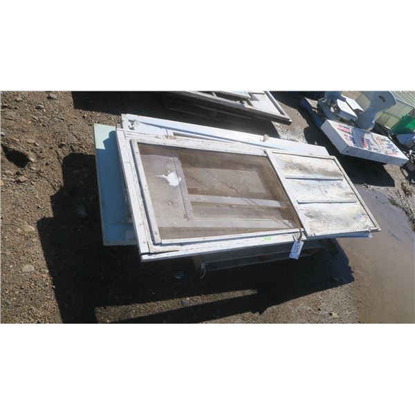 Pallet of older wooden doors