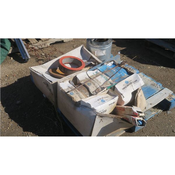 pallet of automotive filters, 2 shocks in box