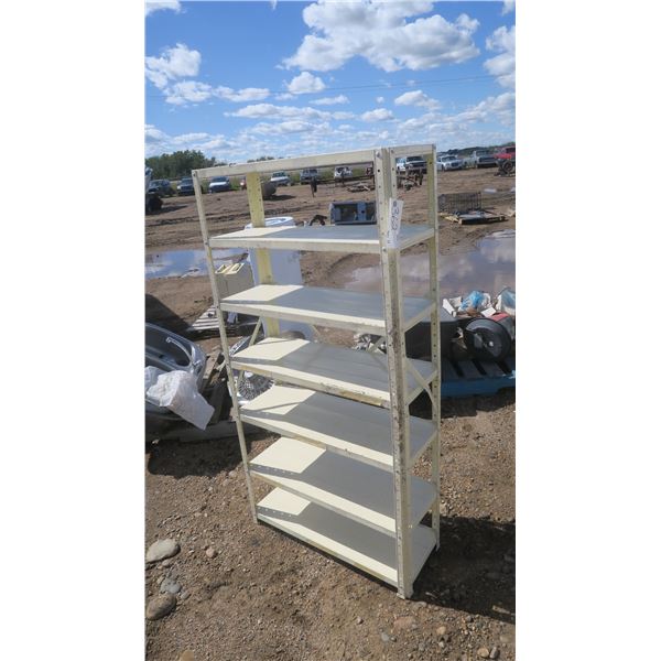 Cream color metal shelf, 7  shelves. 30-1/2" w  x  58-1/2" h  x  11" d