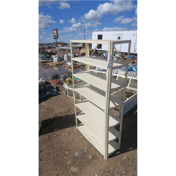 Cream color metal shelf, 7  shelves. 30-1/2" w  x  58-1/2" h  x  11" d