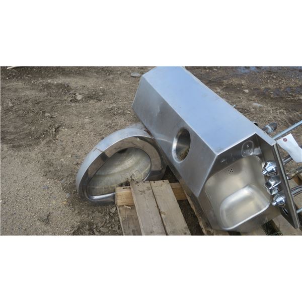 Stainless steel toilet with sink on the back,( jail style)