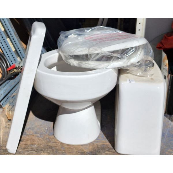 New Toilet Set, Toilet, Tank with Lid, and Seat with Accessories