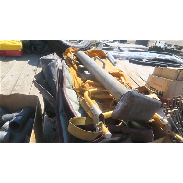 Box of misc. items, trailer jack, older backpack and other items