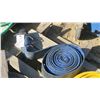 Image 1 : large roll of blue water pump hose
