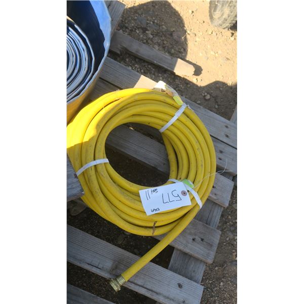 roll of yellow garden hose