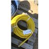 Image 1 : roll of yellow garden hose