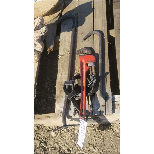 Misc. tools, pipe wrench, 2 crowbars, heel grip straps