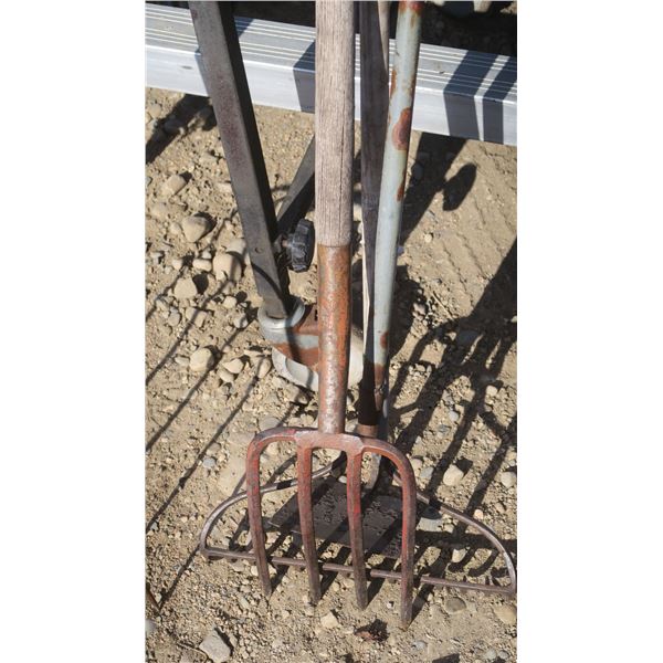 Misc. garden tools, hoe, rake, pitchfork