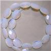 Image 1 : 16X12 MM FACETED OVAL SEA OPAL STRAND