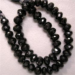 123 CTS BLACK SPINEL RONDELLE STRAND 7 MM