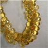 Image 1 : 242 CTS GOLDEN CITRINE BRIOLETTE STRAND 11x6 MM